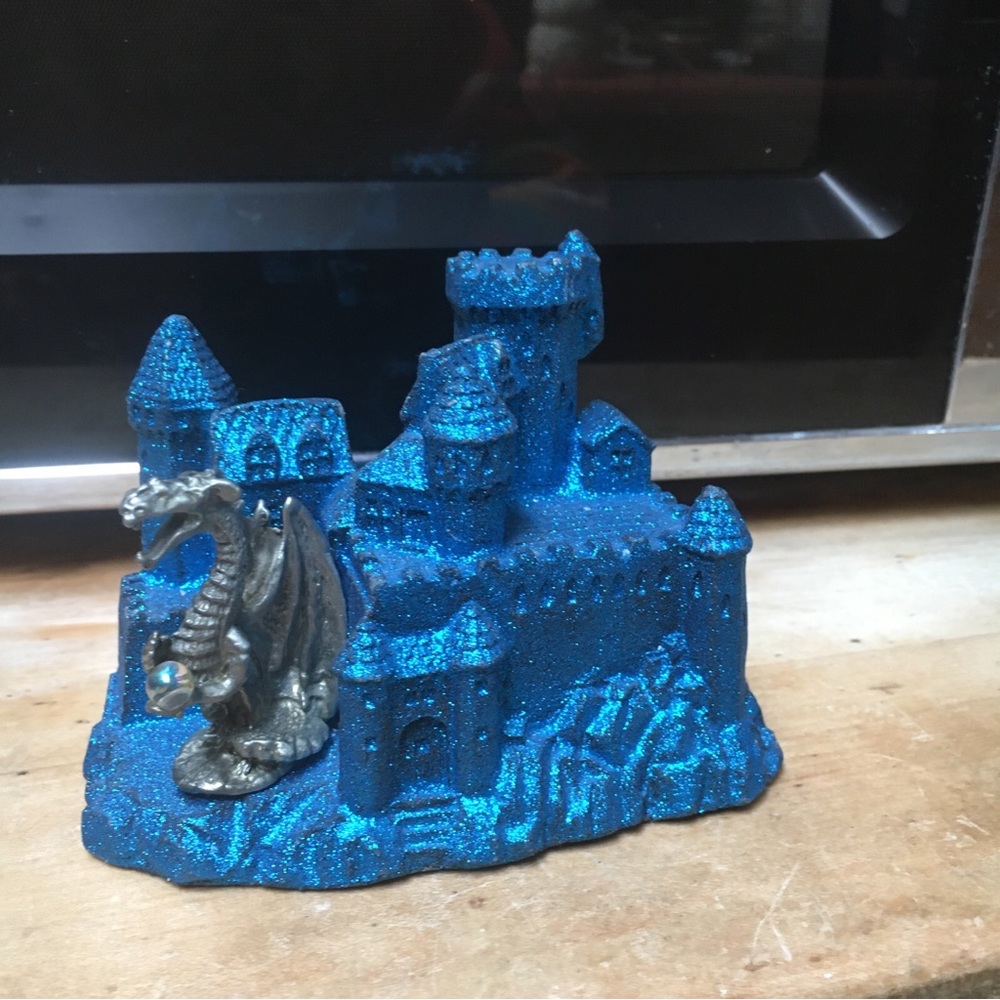Sands of Time dragon with a gazing ball statue.